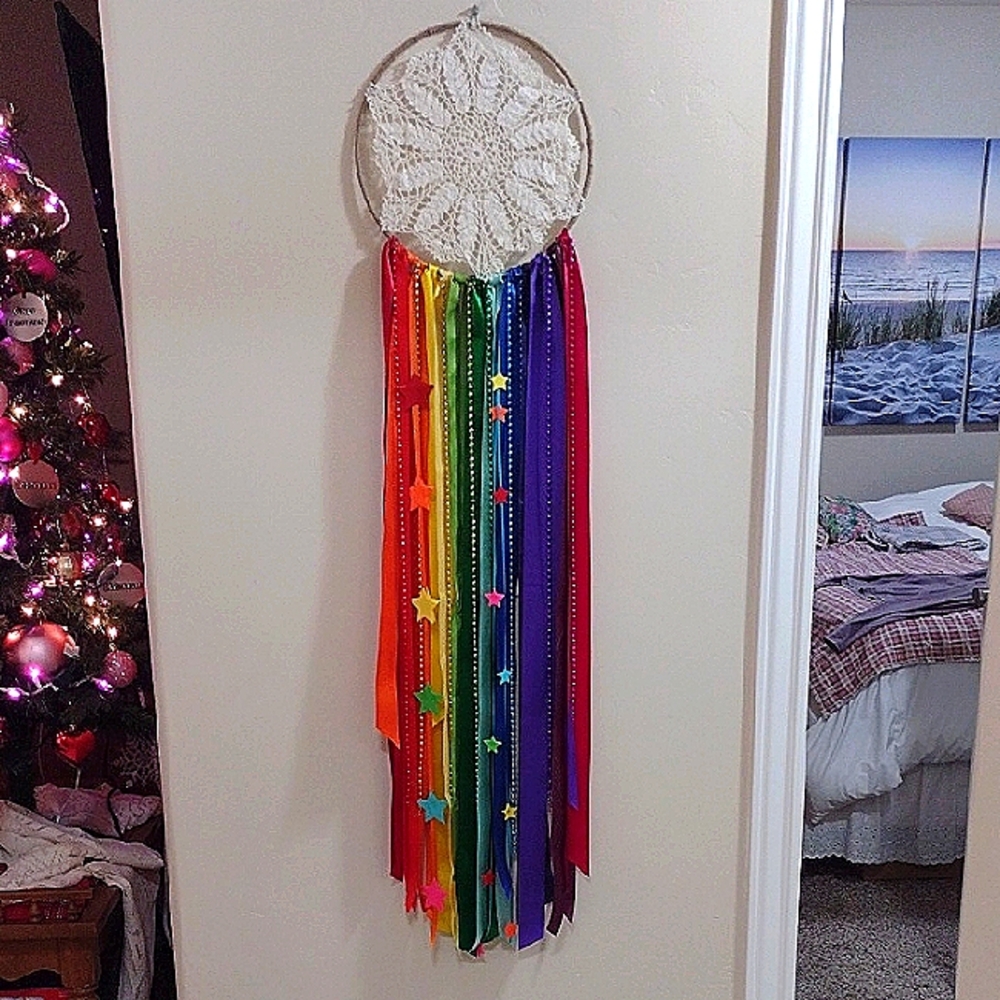 Handmade Dreamcatcher with Rainbow Ribbons and stars and beads.